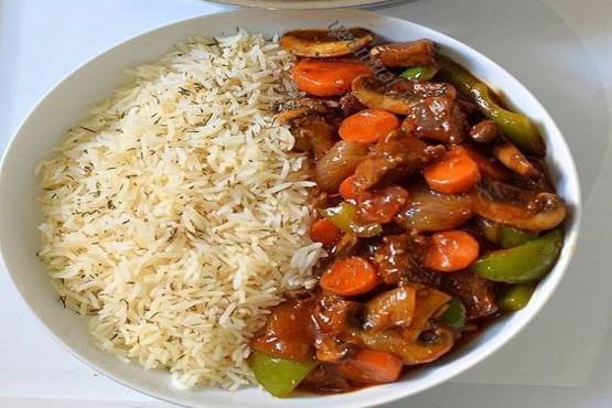 Plain Rice with Gizzard Sauce
